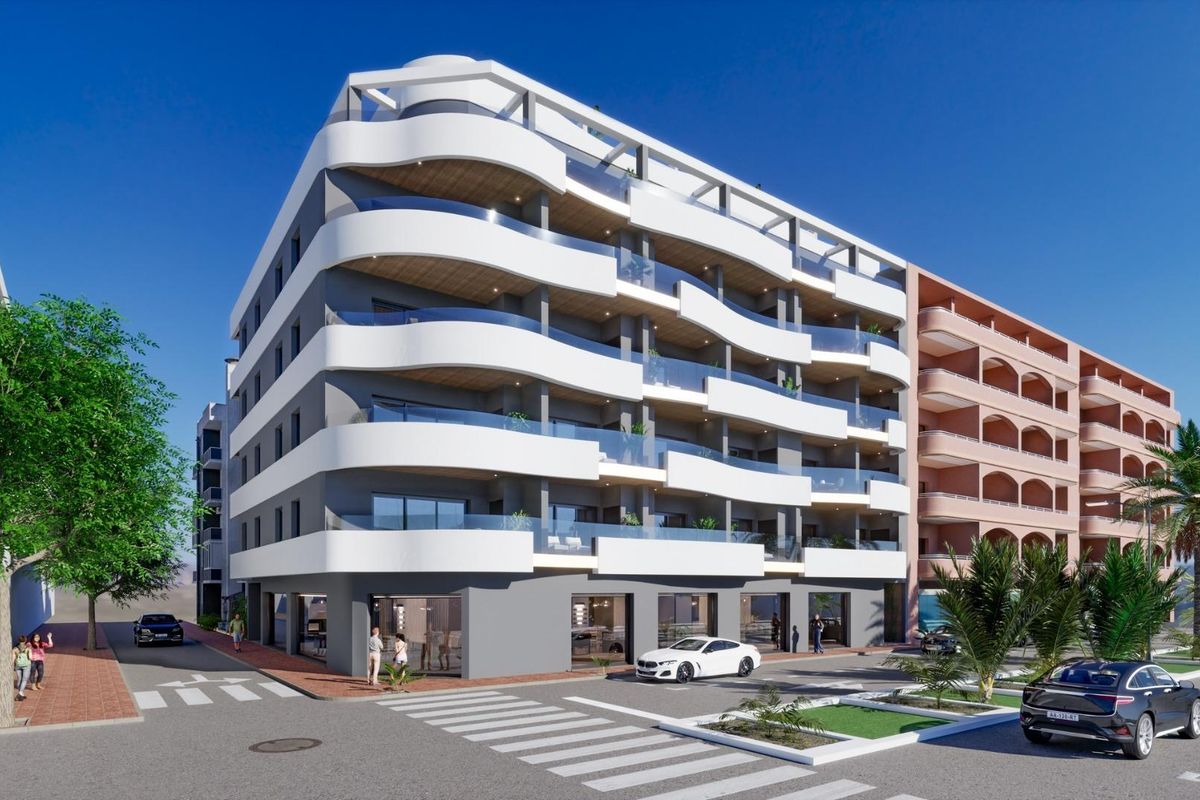 Hoekzicht op een stijlvol drie-slaapkamer appartement in Torrevieja, met moderne architectuur.