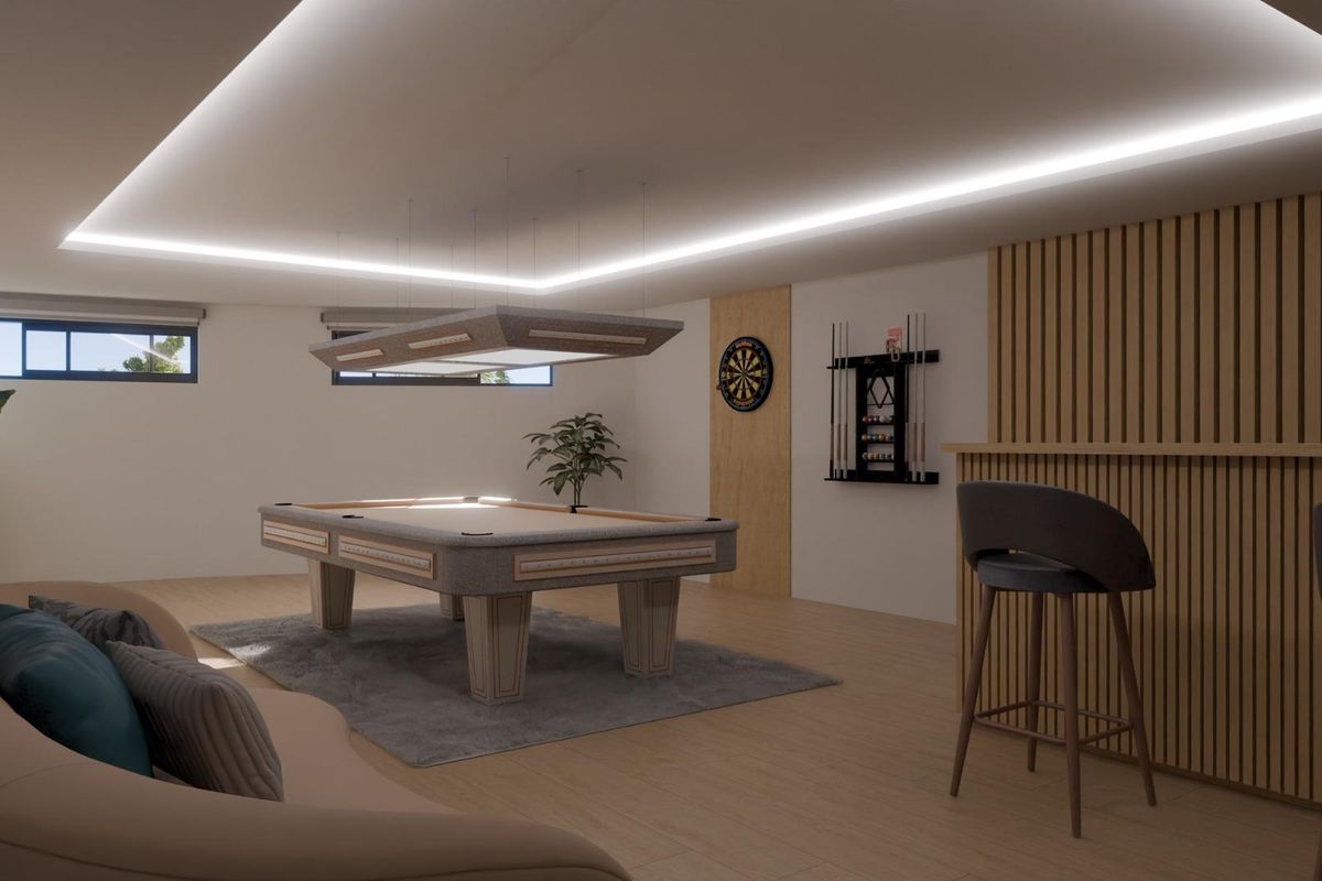 Stijlvolle speelkamer met biljarttafel en bar, gelegen in een townhouse in Mijas.
