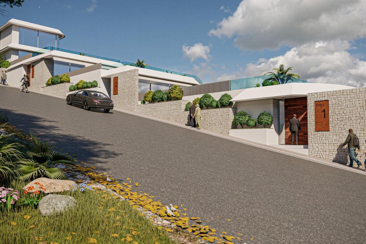 Moderne villa-ingang met aangelegde tuin in Calpe, Costa Blanca. Heeft een stijlvolle stenen façade en oprit.