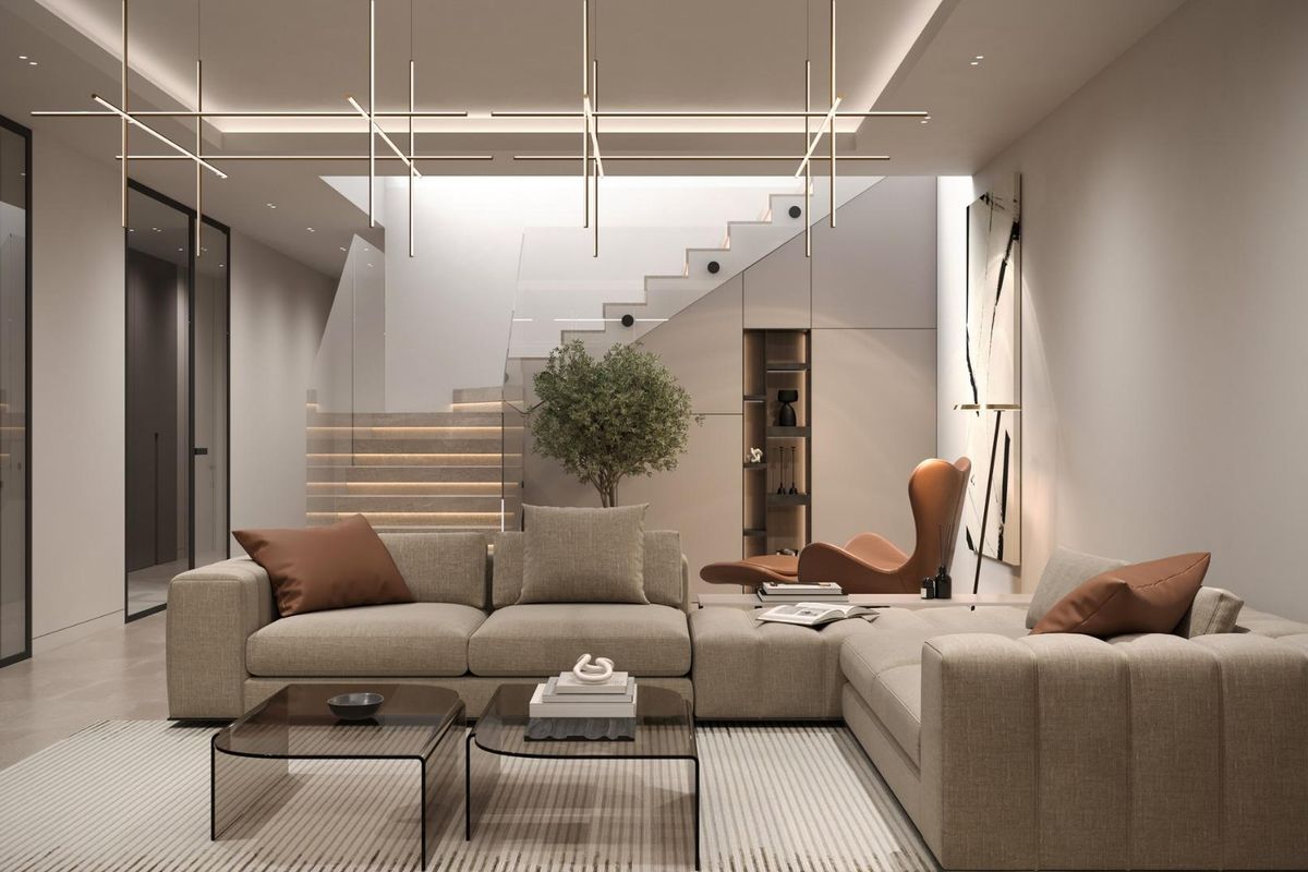 Moderne woonkamer met een gezellige bank en stijlvolle verlichting in een villa in Mijas.