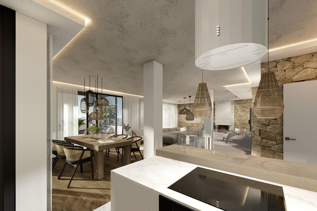 Contemporary keuken met een strak ontwerp en verbinding met de eetruimte in Altea, Spanje.