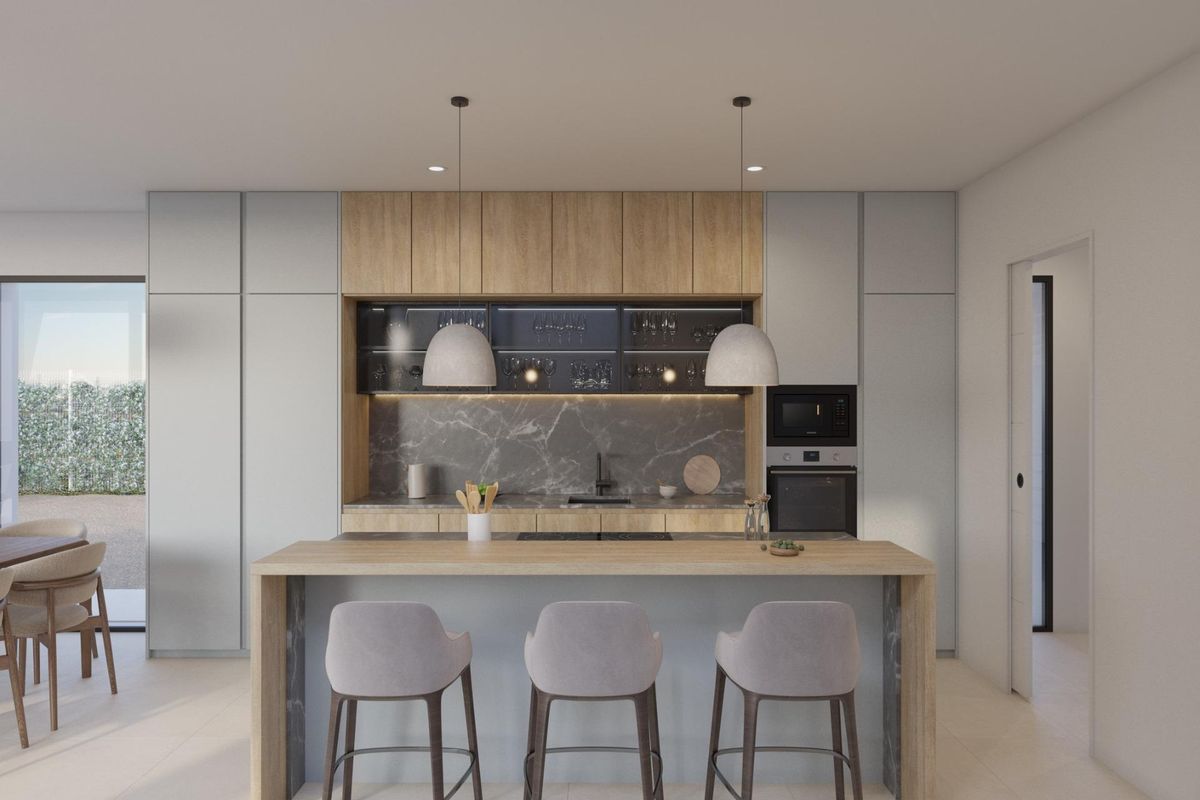 Tegenwoordig keuken in de villa, met een ontbijthoek en moderne apparaten.