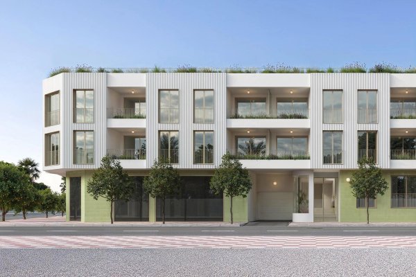 Moderne buitenkant van een 3-slaapkamer appartementgebouw in Jacarilla, Costa Blanca Zuid, met grote ramen.