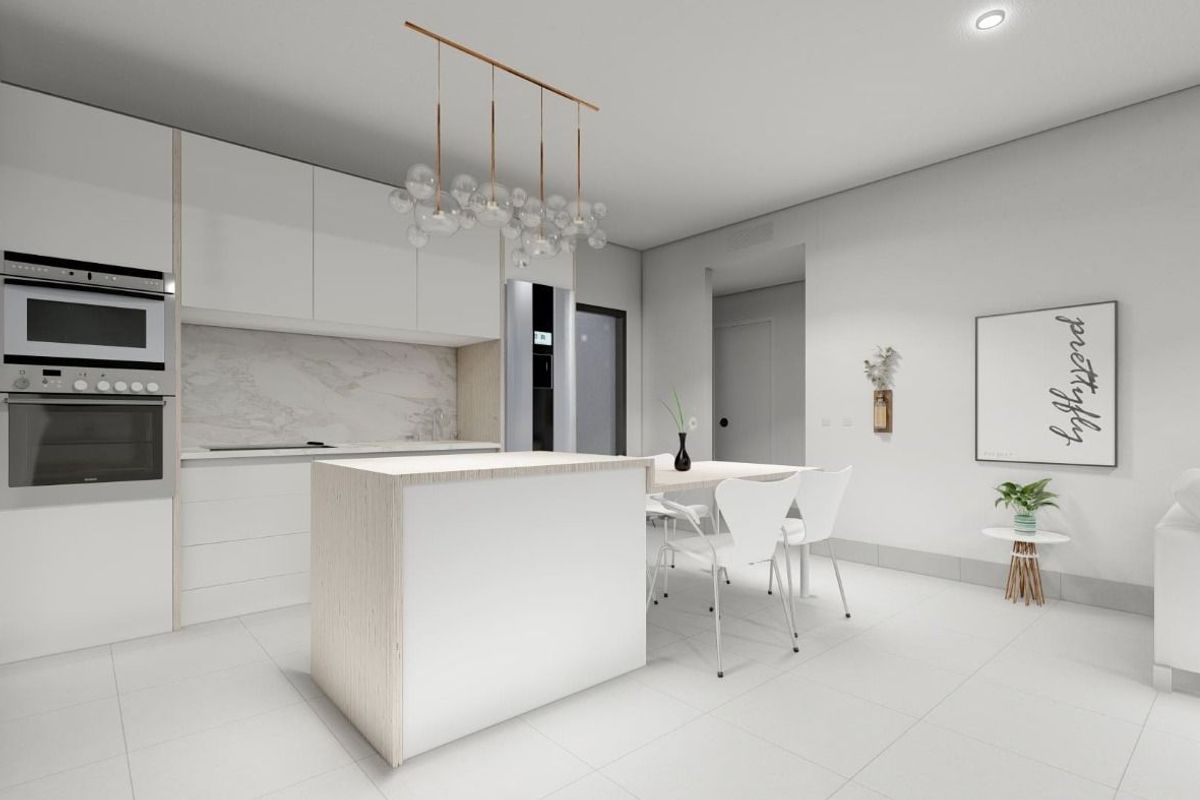 Moderne keuken met elegante kasten en apparaten in de 2-slaapkamer townhouse in Torre Pacheco.