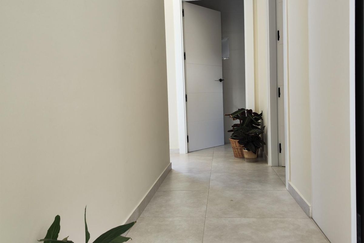 Bright hallway leading to rooms in a modern 3-bed villa in Pinoso, Costa Blanca South, Spain.