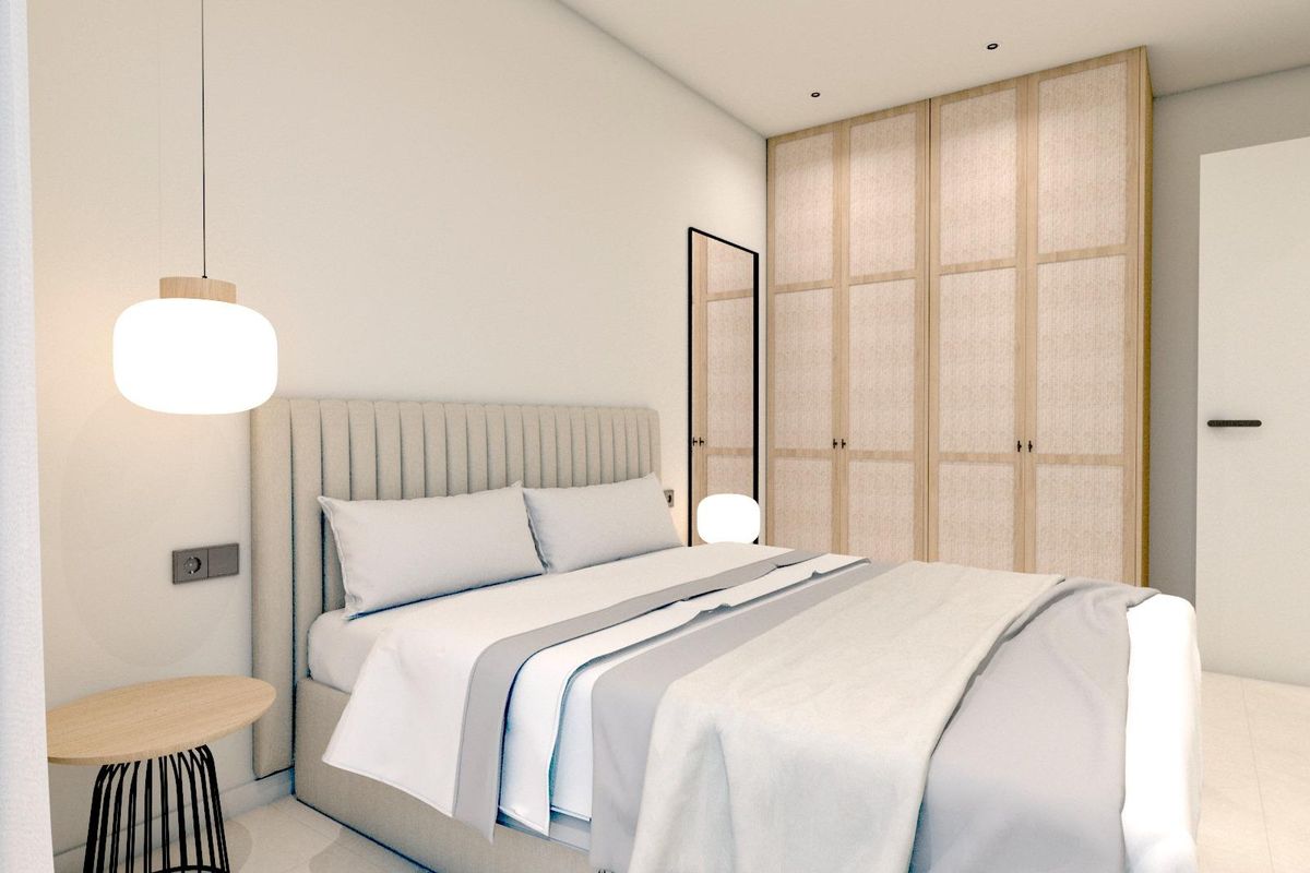 Ruime slaapkamer in een 3-slaapkamer villa in Pilar de La Horadada, met voldoende opbergruimte en moderne decoratie voor comfort.