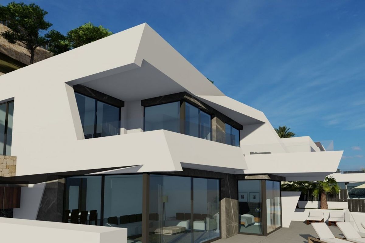 Zijaanzicht van de villa met 4 slaapkamers, met nadruk op het stijlvolle ontwerp en het terras in Calpe, Costa Blanca.
