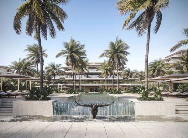 Luxe poolgebied met palmbomen in een modern complex in Estepona, Costa del Sol.