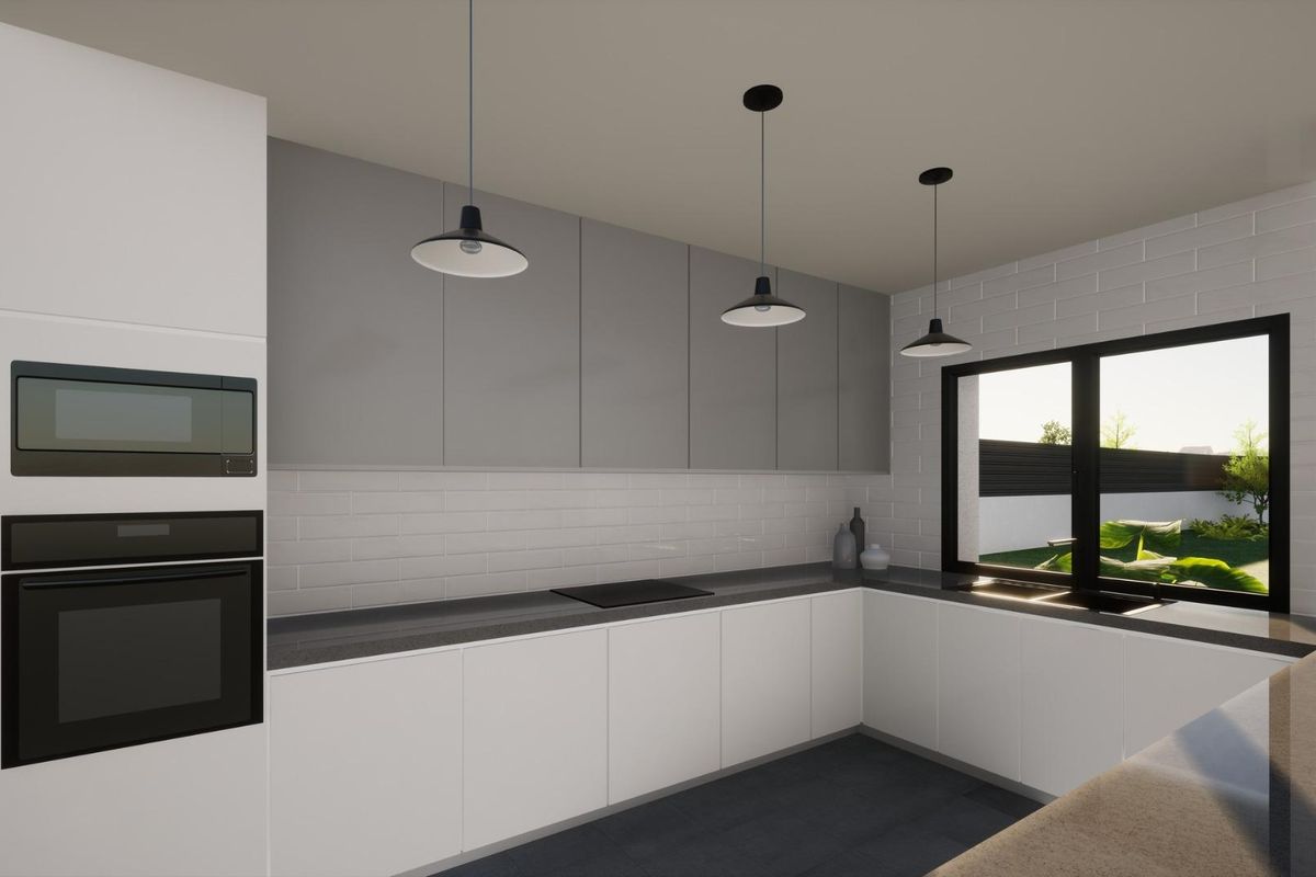 Contemporary kitchen in the Pinoso villa, featuring modern cabinetry and a view of the outdoor space.