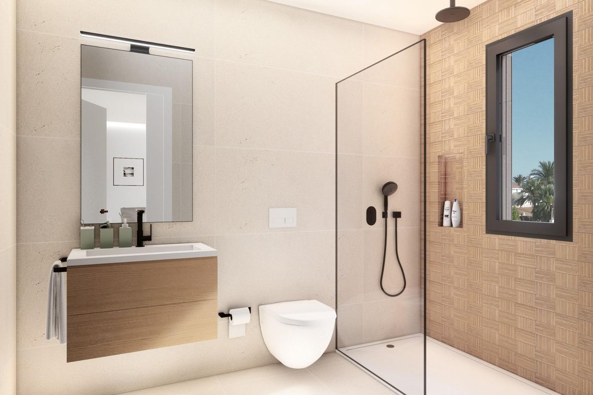 Stijlvolle badkamer met douche, strakke lijnen en moderne armaturen in een appartement in San Pedro del Pinatar.