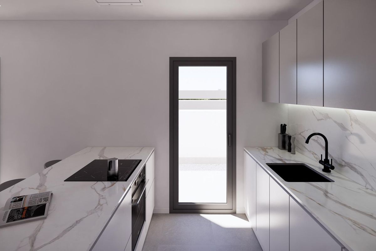 Minimalistische keuken met moderne kasten en afwerkingen in een townhouse in Benijofar, Costa Blanca Zuid.