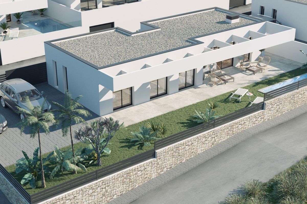 Bird's-eye view of a villa's landscaped garden and pool in Finestrat, highlighting outdoor living spaces.