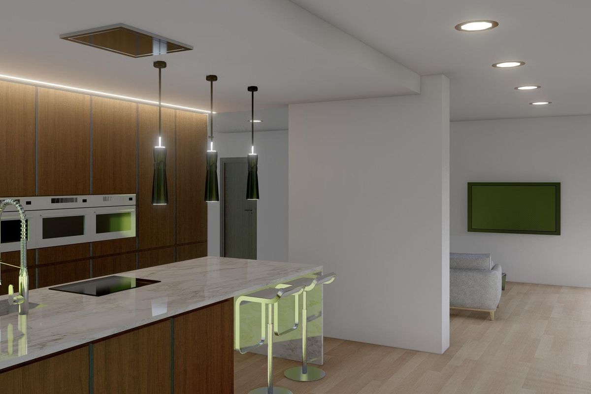 Bright kitchen area with modern appliances in the Pinoso villa, overlooking the living space.
