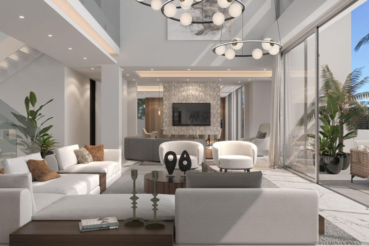 Ruimtelijke woonkamer in een moderne 6-slaapkamer villa in Benahavís, met chique decor en een open indeling.