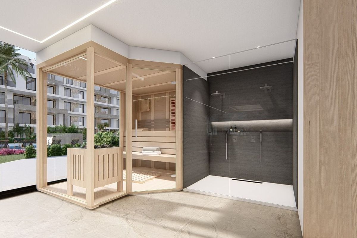 Luxueus sauna- en douchegedeelte in een appartement in Guardamar del Segura met moderne designelementen.