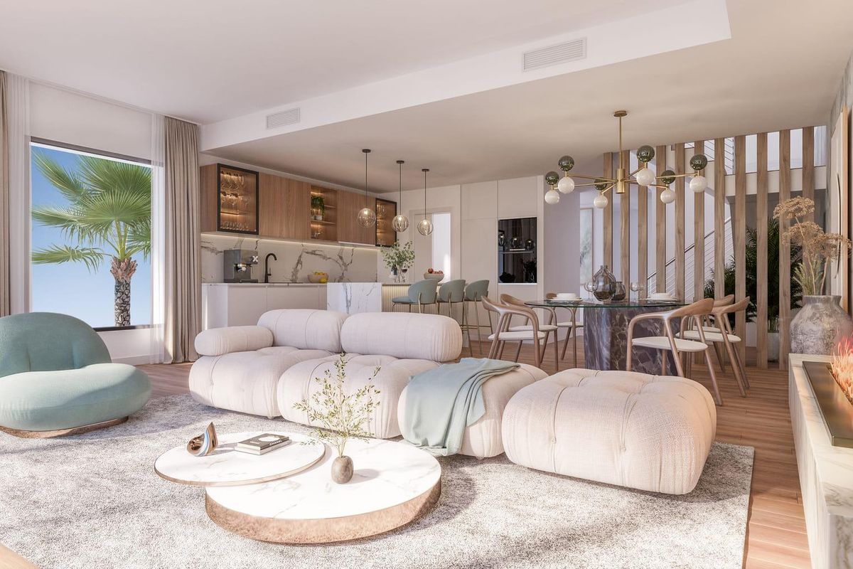Contemporary woonruimte met moderne meubels en een open keuken in een townhouse in Mijas.