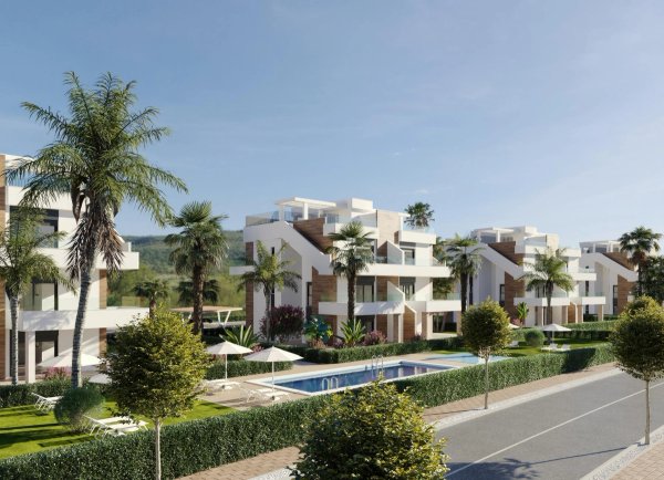 Exterior view of a modern 2-bed apartment complex with a pool and palm trees in Fuente Álamo, Costa Calida.