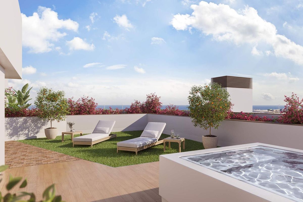 Beautiful outdoor space featuring sun loungers and a hot tub on a terrace in Alicante, perfect for leisure.