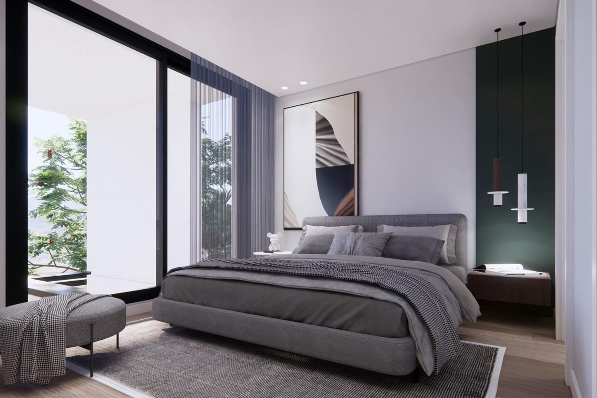 Stijlvolle slaapkamer in een villa in Torre Pacheco met hedendaags design en grote ramen.