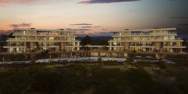 Modern 3-slaapkamer appartementencomplex in Estepona, Costa del Sol, met een schilderachtig landschap en warme zonsondergang.