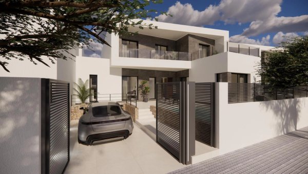 Moderne 3-slaapkamer townhouse buitenkant in Dolores, Costa Blanca Zuid met chique ingang en groen.