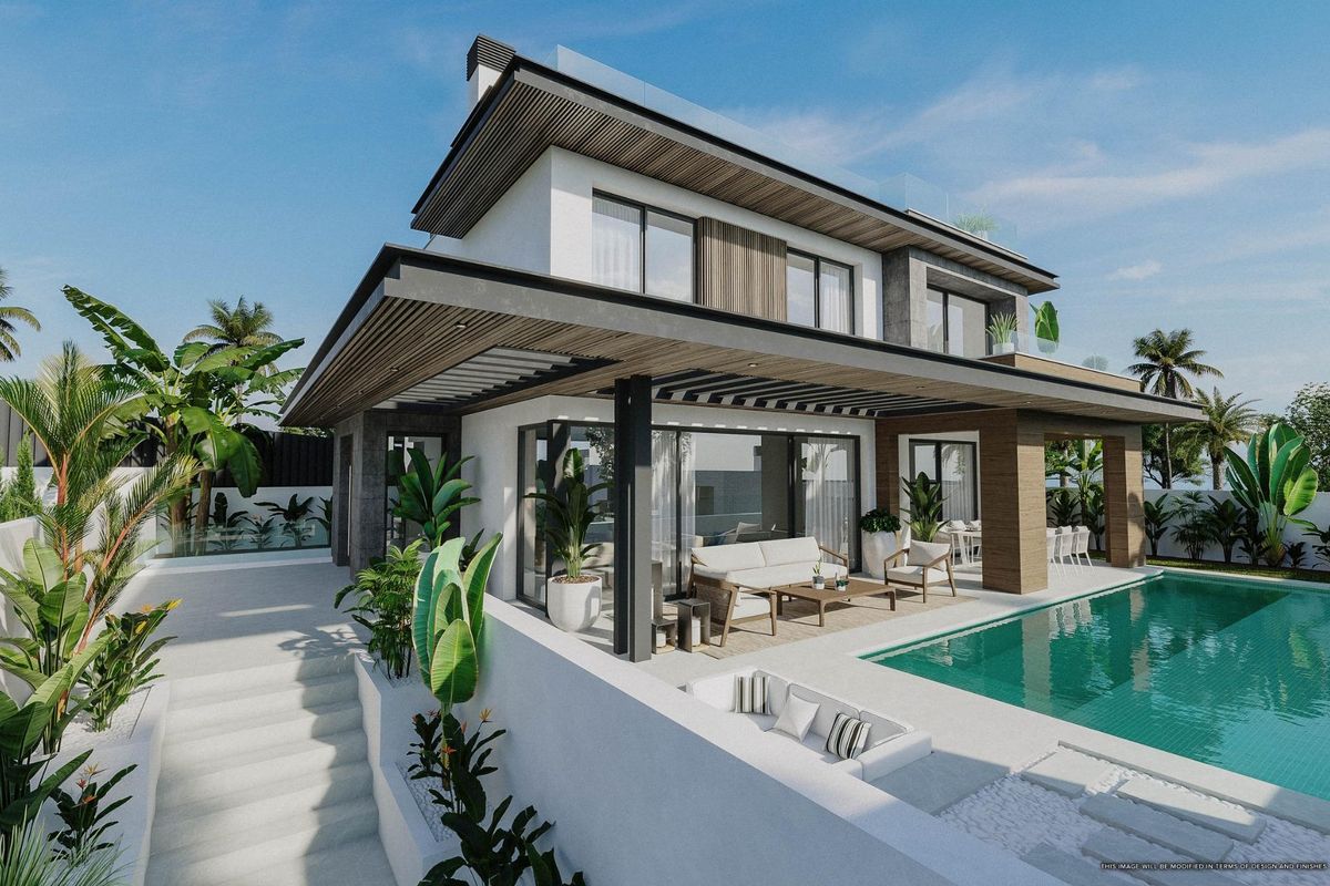 Moderne 3-slaapkamer villa in Mijas met een ruim terras en zwembad omringd door groen.