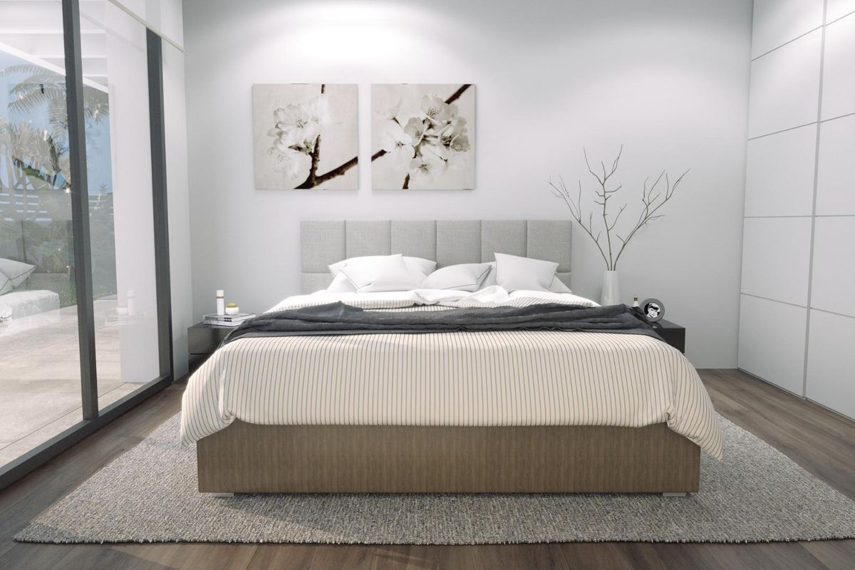 Moderne slaapkamer in een 3-slaapkamer villa in Finestrat, Costa Blanca, met een stijlvol ontwerp en schuifdeuren.