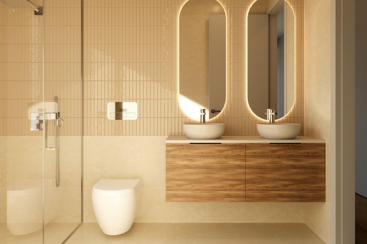 Elegant badkamer met dubbele wastafel, warme houttinten en moderne verlichting in Finestrat villa.