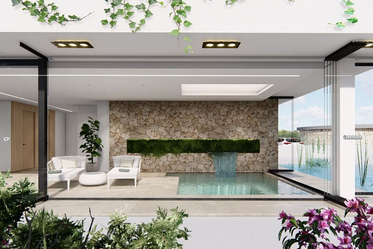 Charmante binnenwaterval in een appartementencomplex in Guardamar del Segura, die een rustige sfeer toevoegt.