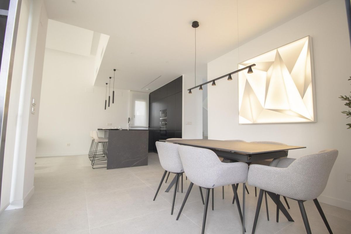 Elegant dining area next to kitchen