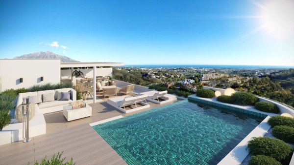 Dakterras met panoramisch uitzicht en een privézwembad in een 4-slaapkamer penthouse in Benahavís, Costa del Sol.