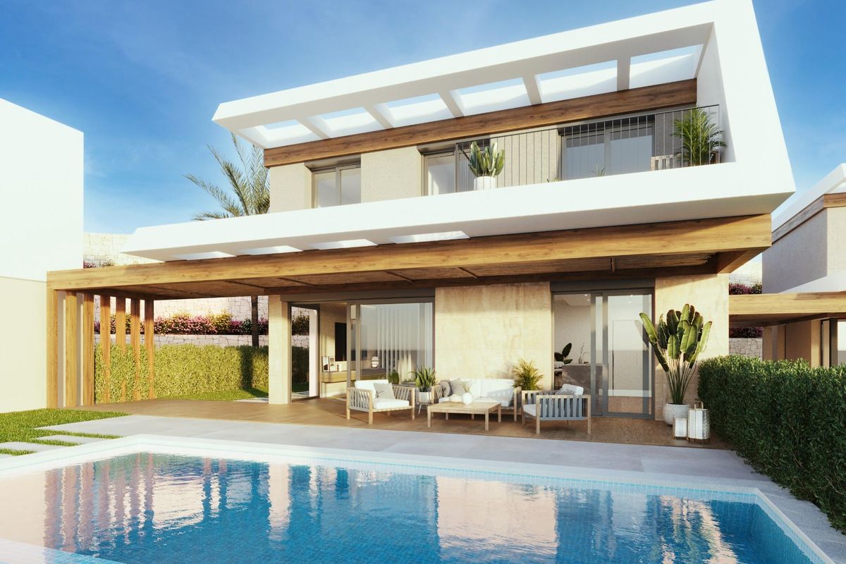 Modern 4-bed villa in Polop with a stylish exterior and pool surrounded by lush greenery.
