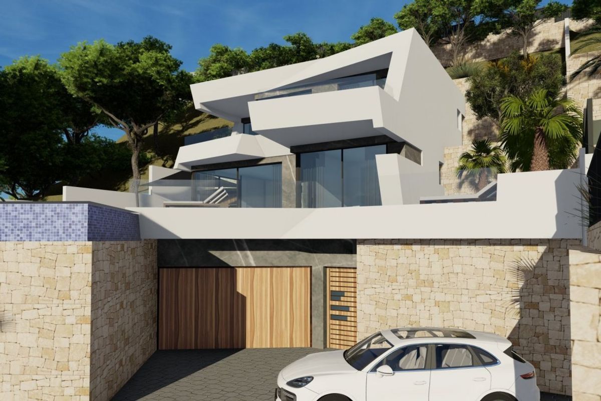Dichtbijzijnde weergave van de oprit en garage van een moderne 4-slaapkamer villa in Calpe, Spanje, met stijlvolle architectuur.