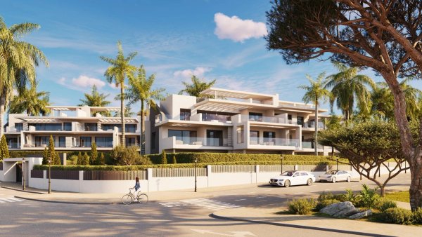 Modern 3-slaapkamer appartementencomplex in Estepona, Costa del Sol, met palmbomen en een zonnige sfeer.