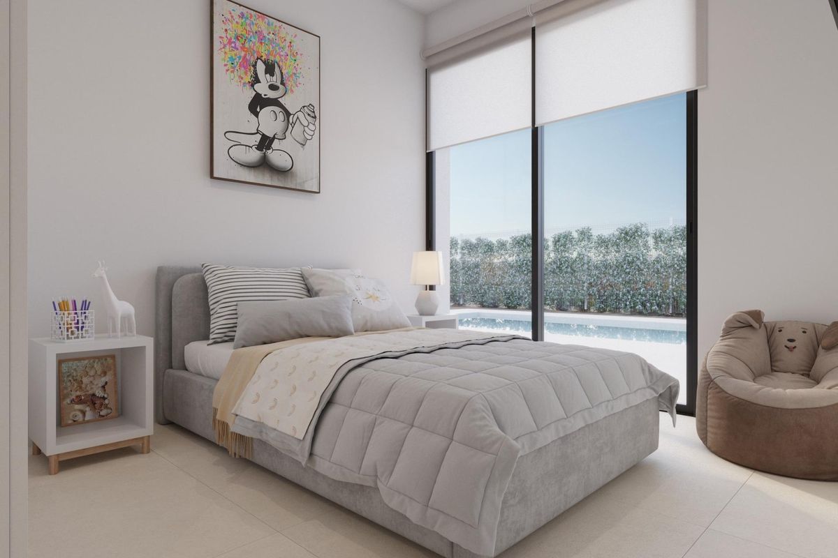 Gezellige slaapkamer in de villa in Fuente Álamo, met een twijfelaar en natuurlijk licht.