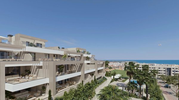 Buitenzicht op een moderne 3-slaapkamer appartement in Estepona, met de Middellandse Zee op de achtergrond.