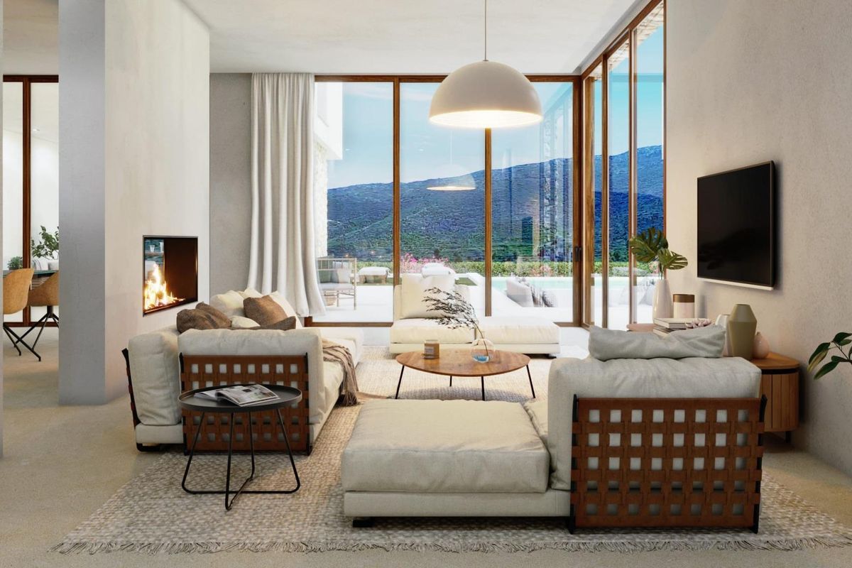 Moderne woonkamer in een 4-slaapkamer villa in Jávea Xàbia, met grote ramen en een gezellige indeling.