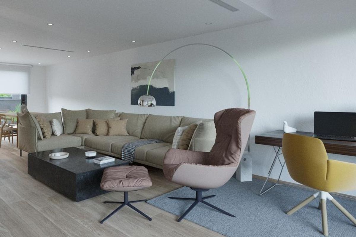 Moderne woonkamer in een 2-slaapkamer appartement met een gezellige bank en een bureau in Finestrat.