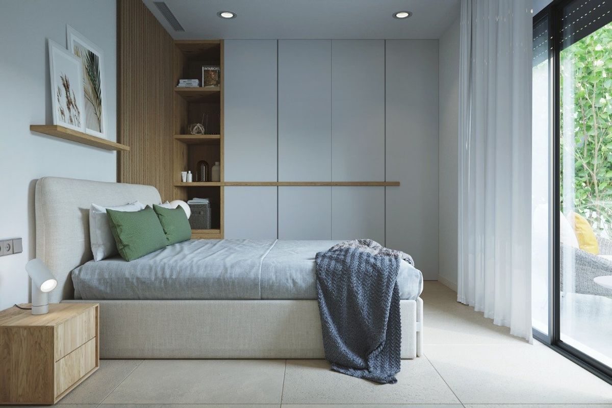 Gezellige slaapkamer in een 2-slaapkamer villa met grote ramen en groene accenten in Baños y Mendigo, Costa Calida.