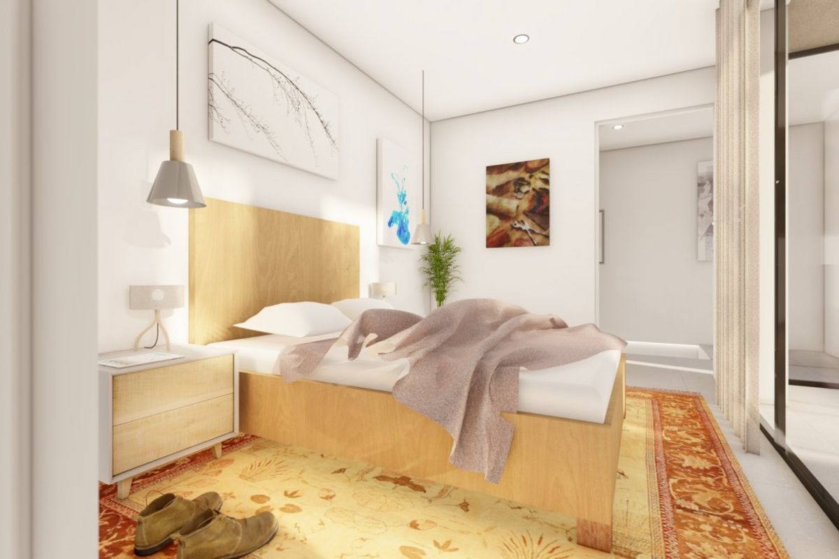 Gezellige slaapkamer met een warme decoratie en een tweepersoonsbed in de 3-slaapkamer villa in Los Urrutias.