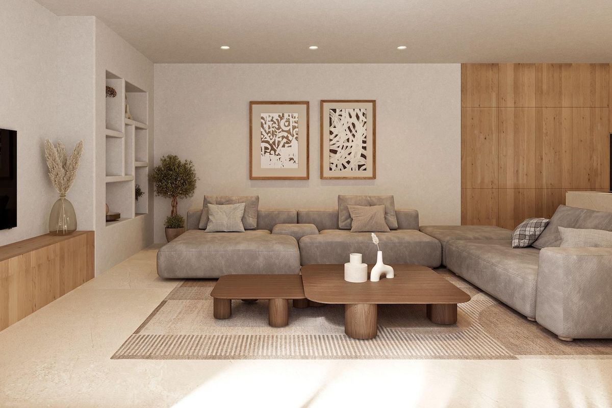 Gezellige woonkamer van de villa, met comfortabele zithoek en lichte houten accenten.