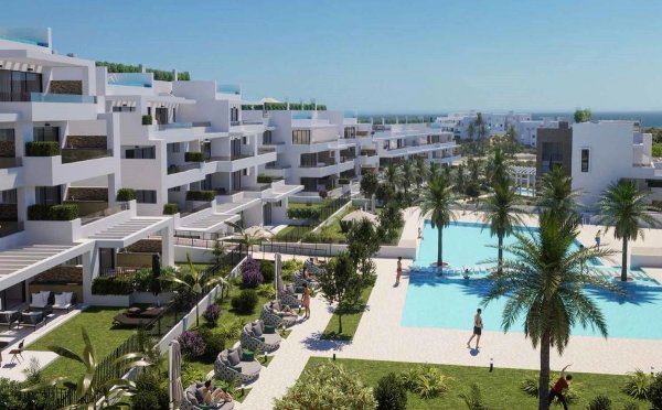 Luchtfoto van modern appartementencomplex met zwembad en tuinen in Estepona, Costa del Sol, Spanje.