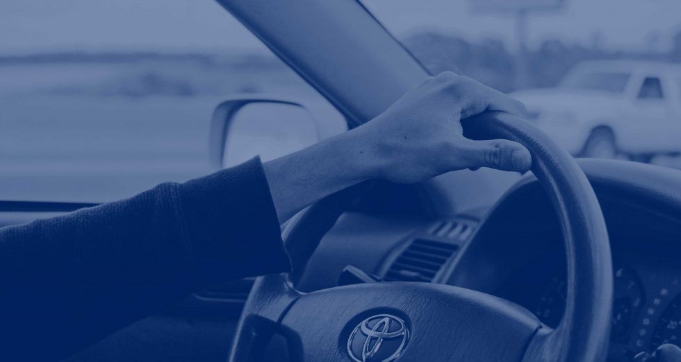 Someon Holding is toyota steer Wheel