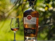 Worthy Park bottle and glass