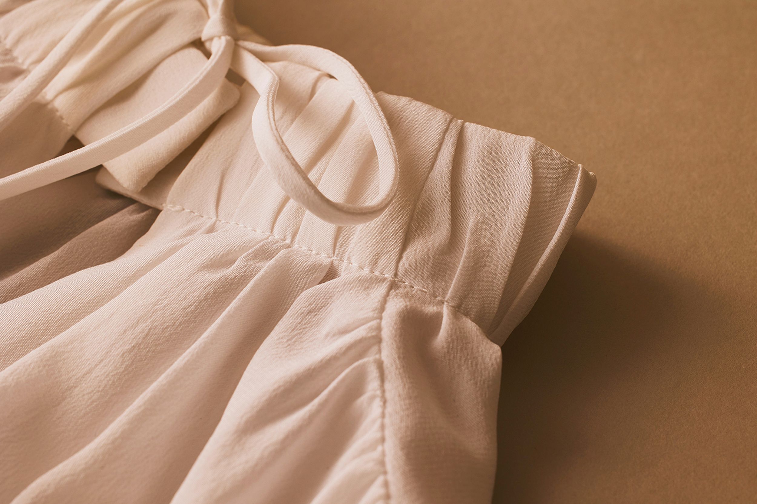 Scanlan Theodore silk blouse with close detailed view of silk fabrication and collar.