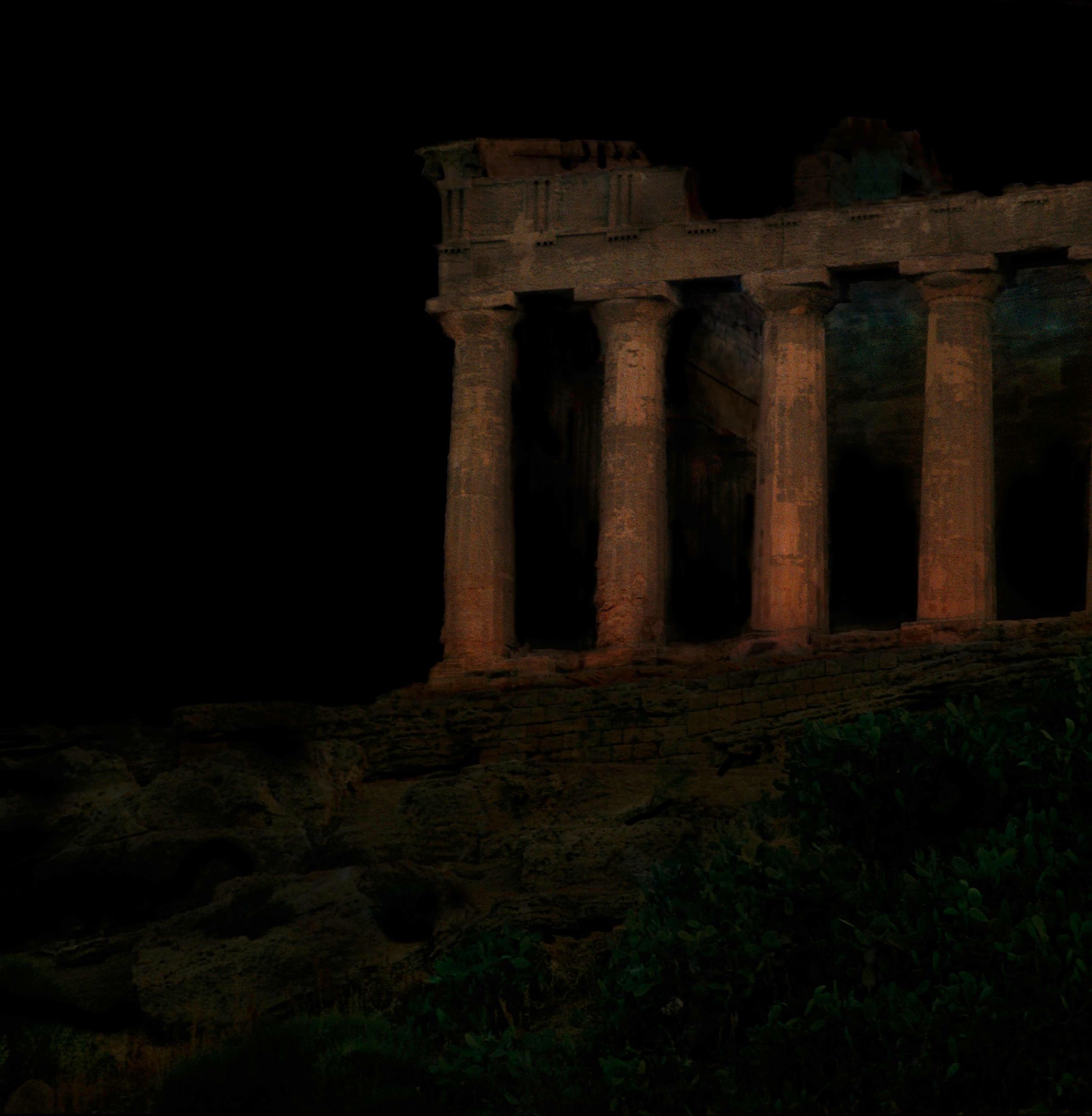 Ancient Greek temple ruins in the dark
