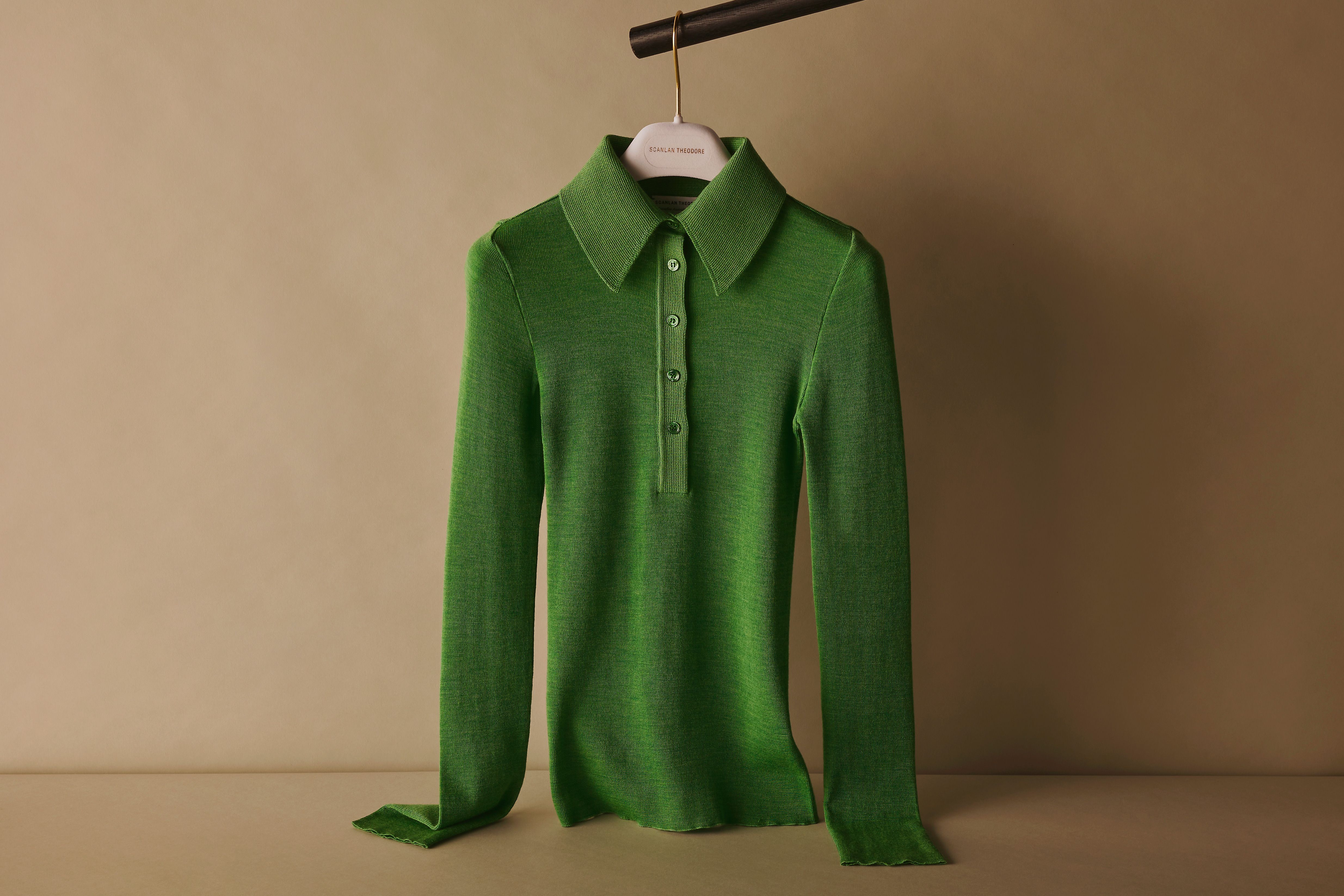 Scanlan Theodore green babywool shirt with collar and button up detail hanging on a rail
