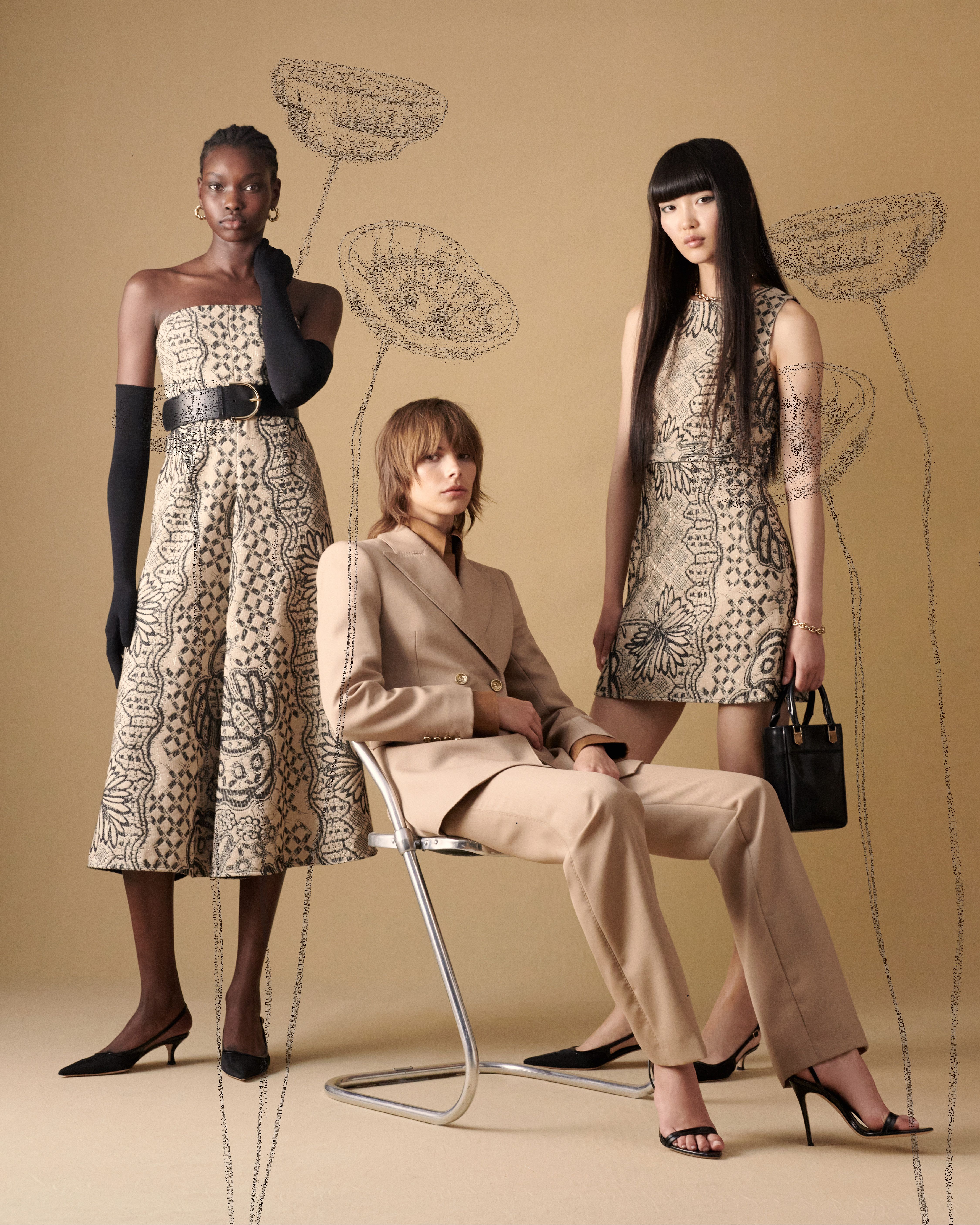 Three models posing wearing formal wear in tones of black and beige with black poppy illustrations overlaid on top