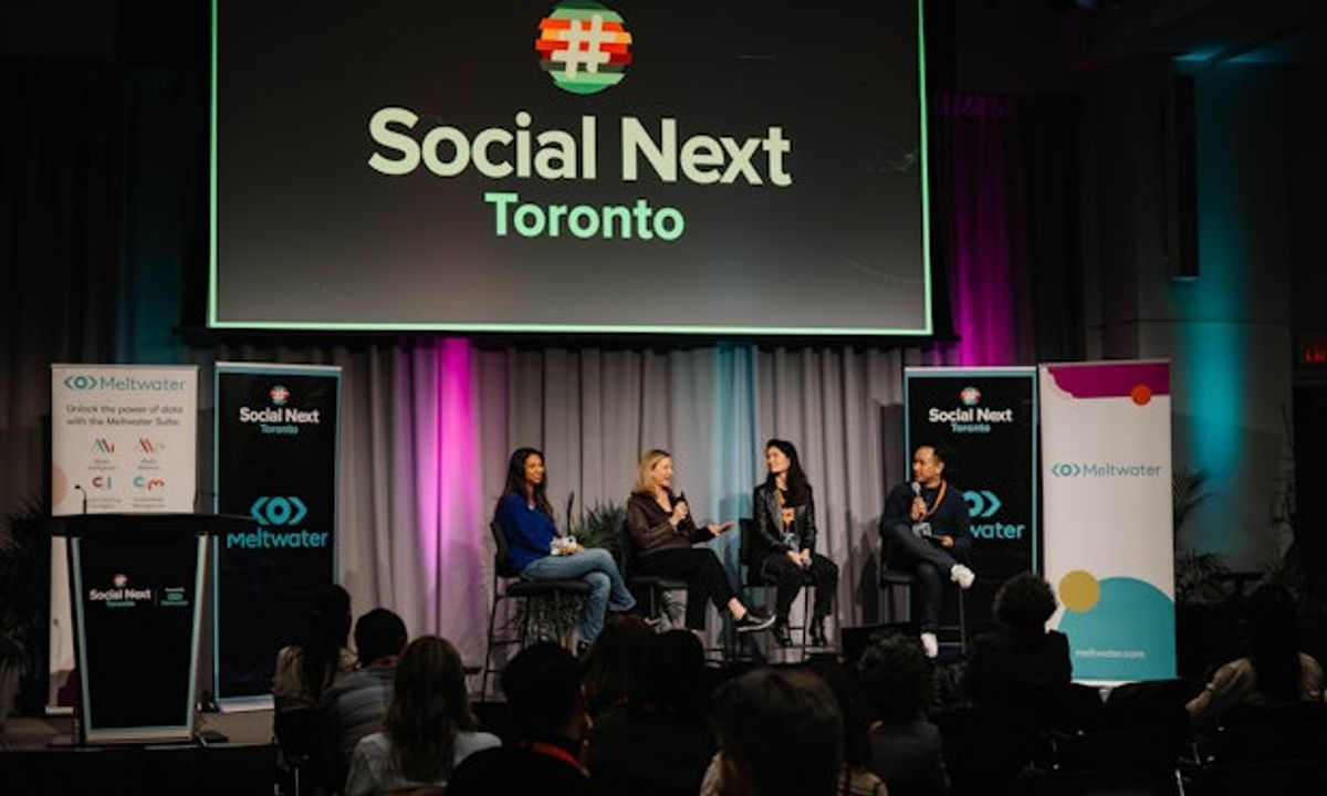A panel on stage at SocialNext Toronto