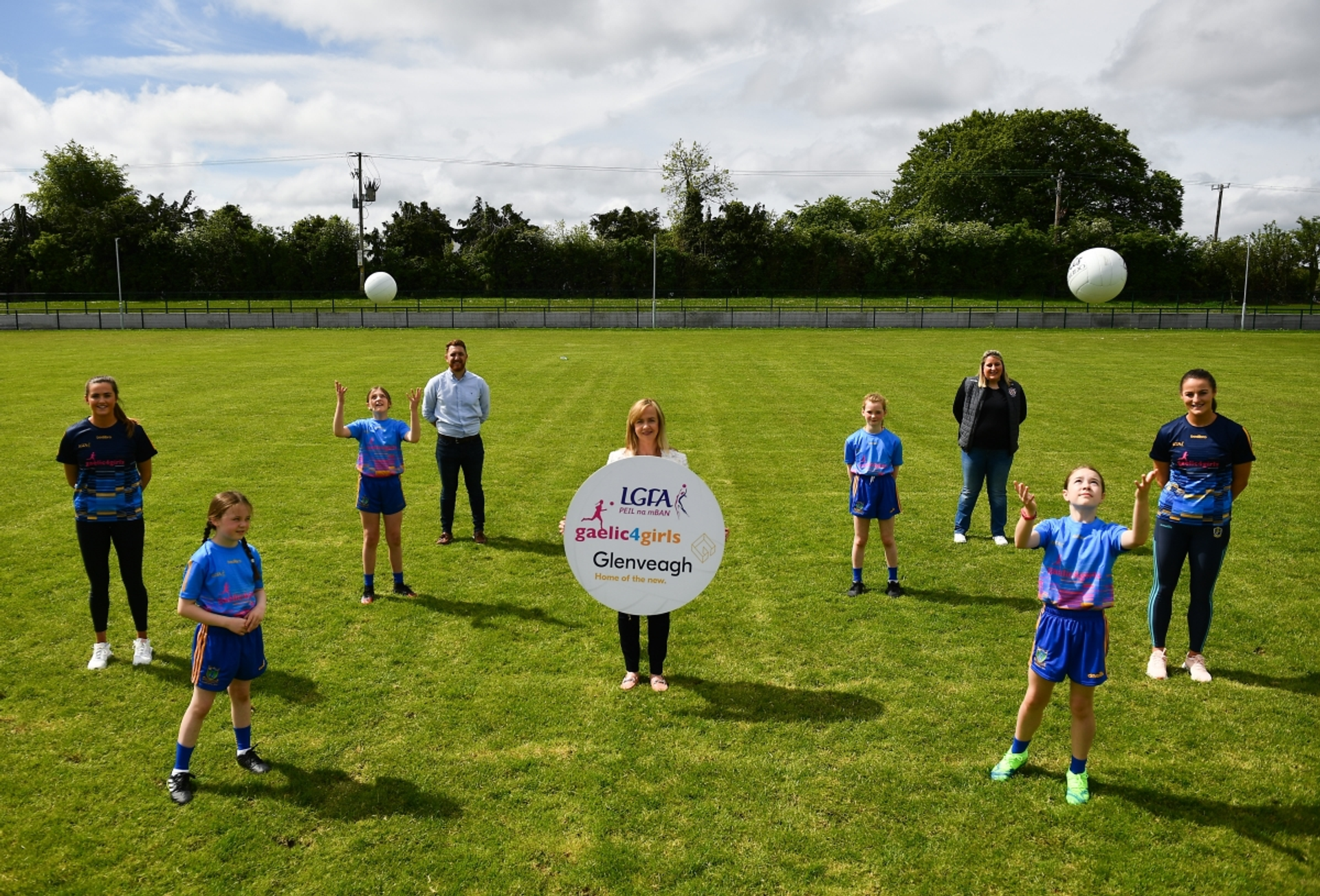 LGFA sponsored by Glenveagh Homes, Ambassadors and Glenveagh Homes rep on GAA pitch